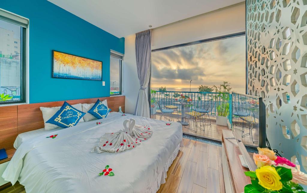 Beach Front Best View bedroom at Cani Beach House, with the sea through the window