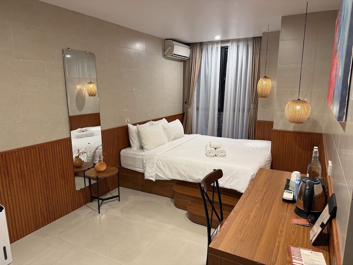 First Hoianese Center Hotel - Cultural Experiential Hotels pool and grounds in Hoi An Old Town