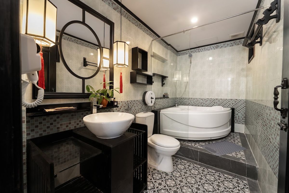 Hoianese Quiet Old Town Hotel - Cultural Experiential Hotels room interior in Hoi An Old Town